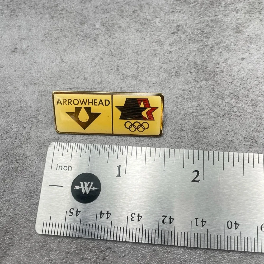 Vintage 1980 LAOLY Arco Olympics Classic Gold-Tone Arrowhead Water Lapel Pin 80s